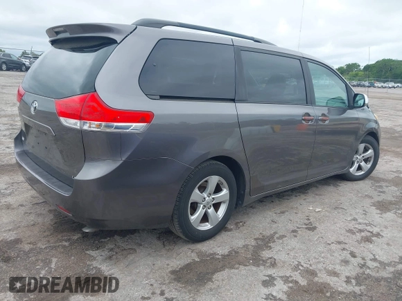 2014 Toyota Sienna LE AAS with VIN 5TDKK3DC9ES448461, listed as a IAAI auction lot 41986724 with 102,930 mi miles and . Bid and sale history available at carsss.com. Image 4.