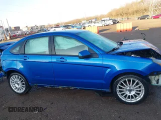 2011 Ford Focus SES with VIN 1FAHP3GN8BW165687, listed as a IAAI auction lot 41854781 with 153,445 mi miles. Bid and sale history available at carsss.com. Image 14.