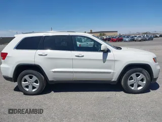 2012 Jeep Grand Cherokee Laredo with VIN 1C4RJEAG0CC210274, listed as a IAAI auction lot 42099944 with 177,527 mi miles. Bid and sale history available at carsss.com. Image 13.