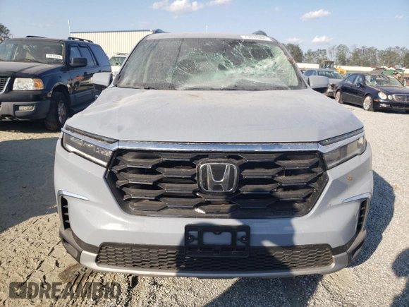 2024 Honda Pilot Touring with VIN 5FNYG2H70RB015463, listed as a Copart auction lot 73832964 with 14,606 mi miles and Salvage title. Bid and sale history available at DreamBid. Image 5.