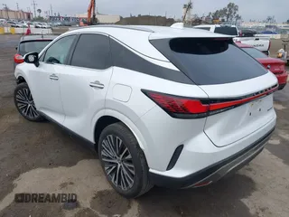 2023 Lexus RX with VIN 2T2BAMBA6PC013530, listed as a IAAI auction lot 41903784 with 18,711 mi miles. Bid and sale history available at carsss.com. Image 3.