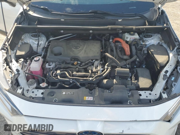 2021 Toyota RAV4 Hybrid XSE with VIN 2T3E6RFV1MW028094, listed as a Copart auction lot 52596615 with 68,497 mi miles and Salvage title. Bid and sale history available at DreamBid. Image 11.