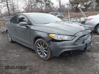 2017 Ford Fusion SE z VIN 3FA6P0H70HR106375, wystawiony jako IAAI lot #41540982 z przebiegiem 175 659 mil mil oraz . Historia ofert i sprzedaży dostępna na DreamBid. Obrazek 1.