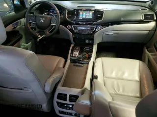 2020 Honda Pilot Touring 7-Passenger z VIN 5FNYF6H67LB031880, wystawiony jako Copart lot #46083925 z przebiegiem 59 729 mil mil oraz Szkoda całkowita • Salvage title. Historia ofert i sprzedaży dostępna na DreamBid. Obrazek 8.