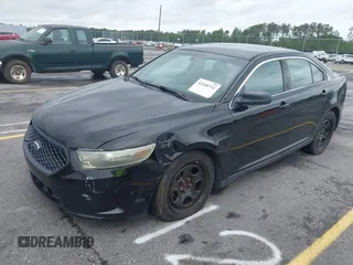 2014 Ford Police Interceptor with VIN 1FAHP2MKXEG105669, listed as a IAAI auction lot 42240752 with 133,148 mi miles and . Bid and sale history available at DreamBid. Image 2.