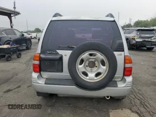 1999 Suzuki Grand Vitara JLX z VIN JS3TD62V9X4123460, wystawiony jako Copart lot #58574925 z przebiegiem 260 368 mil mil oraz Szkoda całkowita • Salvage title. Historia ofert i sprzedaży dostępna na DreamBid. Obrazek 6.