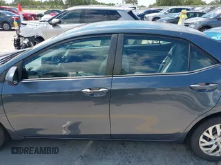 2018 Toyota Corolla L with VIN 5YFBURHE1JP832911, listed as a IAAI auction lot 42237901 with 92,158 mi miles and . Bid and sale history available at DreamBid. Image 14.