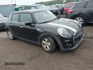2020 MINI Hardtop 4 Door Cooper with VIN WMWXU7C04L2L58635, listed as a IAAI auction lot 42383785 with 27,160 mi miles and . Bid and sale history available at DreamBid. Image 1.