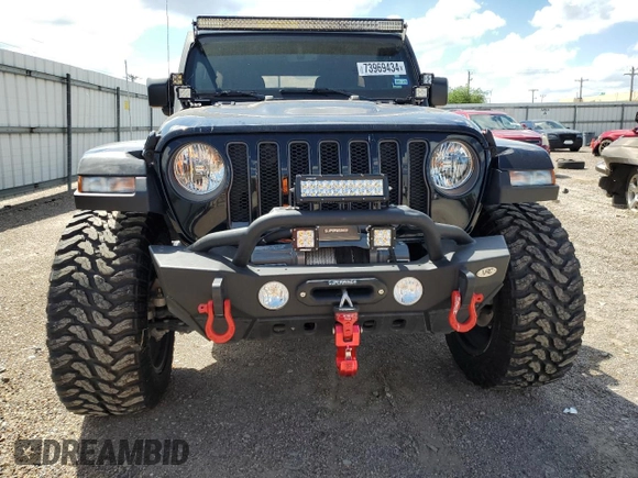 2023 Jeep Wrangler Rubicon with VIN 1C4HJXFG3PW682375, listed as a Copart auction lot 73969434 with Not provided miles and Salvage title. Bid and sale history available at DreamBid. Image 5.