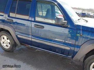 2003 Jeep Liberty Sport with VIN 1J4GL48K73W580572, listed as a IAAI auction lot 41846727 with 183,553 mi miles. Bid and sale history available at carsss.com. Image 6.