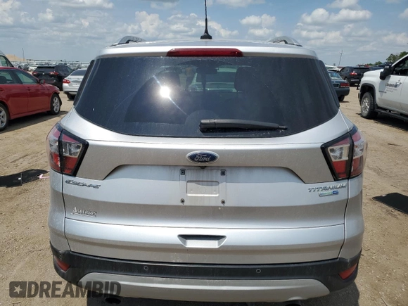 2018 Ford Escape Titanium with VIN 1FMCU9J99JUC89677, listed as a Copart auction lot 60421545 with 98,021 mi miles and Salvage title. Bid and sale history available at DreamBid. Image 6.