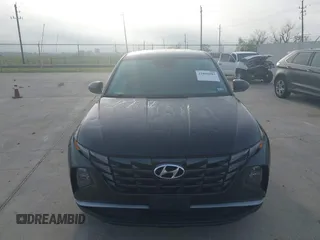 2022 Hyundai Tucson SE with VIN 5NMJA3AE7NH060409, listed as a IAAI auction lot 41884283 with 29,458 mi miles and . Bid and sale history available at carsss.com. Image 12.