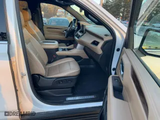 2021 Chevrolet Tahoe Premier with VIN 1GNSKSKD4MR111013, listed as a Copart auction lot 41960855 with 124,443 mi miles and Clean Title. Bid and sale history available at carsss.com. Image 5.