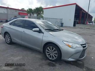 2017 Toyota Camry Hybrid LE z VIN 4T1BD1FK1HU218086, wystawiony jako IAAI lot #40202047 z przebiegiem 67 673 mil mil oraz . Historia ofert i sprzedaży dostępna na DreamBid. Obrazek 1.