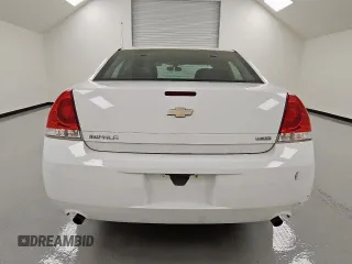 2014 Chevrolet Impala LS z VIN 2G1WA5E3XE1170538, wystawiony jako Copart lot #57675165 z przebiegiem 154 114 mil mil oraz Czysty tytuł • Clean title. Historia ofert i sprzedaży dostępna na DreamBid. Obrazek 6.