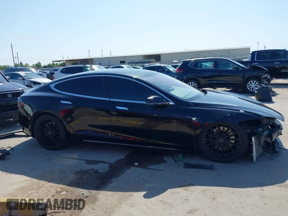 2021 Tesla Model S Long Range Plus with VIN 5YJSA1E28MF426080, listed as a IAAI auction lot 41979326 with 125,328 mi miles and . Bid and sale history available at DreamBid. Image 14.