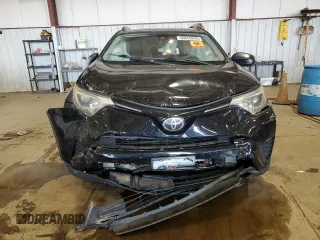 2018 Toyota RAV4 LE with VIN 2T3BFREV7JW717699, listed as a Copart auction lot 60656045 with Not provided miles and Salvage title. Bid and sale history available at DreamBid. Image 5.