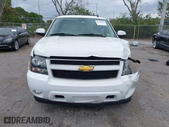 2014 Chevrolet Suburban LT with VIN 1GNSCJE06ER231476, listed as a IAAI auction lot 41768616 with 88,581 mi miles. Bid and sale history available at carsss.com. Image 12.