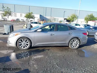 2013 Hyundai Azera with VIN KMHFH4JG3DA230844, listed as a IAAI auction lot 41817997 with 129,163 mi miles. Bid and sale history available at carsss.com. Image 15.