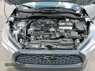 2024 Toyota Corolla Cross L z VIN 7MUAAAAGXRV083889, wystawiony jako Copart lot #69090035 z przebiegiem 20 678 mil mil oraz Szkoda całkowita • Salvage title. Historia ofert i sprzedaży dostępna na DreamBid. Obrazek 17.