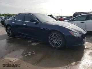 2015 Maserati Ghibli with VIN ZAM57XSA6F1146076, listed as a Copart auction lot 52474303 with 82,575 mi miles. Bid and sale history available at carsss.com. Image 4.