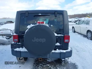2014 Jeep Wrangler Sport with VIN 1C4AJWAG5EL285994, listed as a IAAI auction lot 41558673 with 98,779 mi miles and . Bid and sale history available at DreamBid. Image 15.