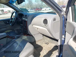 2003 GMC Envoy SLE with VIN 1GKDT13S432364768, listed as a IAAI auction lot 41467418 with 220,170 mi miles. Bid and sale history available at carsss.com. Image 5.