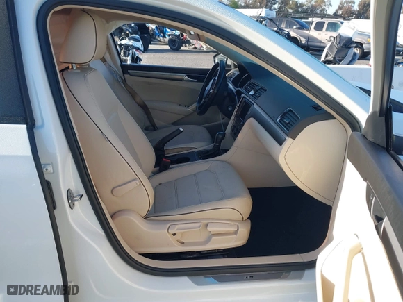 2018 Volkswagen Passat 2.0T S with VIN 1VWAA7A35JC009020, listed as a IAAI auction lot 41955626 with 99,900 mi miles. Bid and sale history available at carsss.com. Image 5.