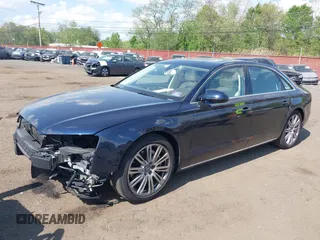 2014 Audi A8 3.0T z VIN WAURGAFD7EN005979, wystawiony jako IAAI lot #42169900 z przebiegiem 126 523 mil mil oraz . Historia ofert i sprzedaży dostępna na DreamBid. Obrazek 6.