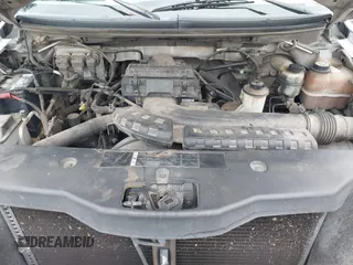 2005 Ford F-150 XLT z VIN 1FTPX04595KC18420, wystawiony jako IAAI lot #41493863 z przebiegiem 181 395 mil mil oraz . Historia ofert i sprzedaży dostępna na DreamBid. Obrazek 10.