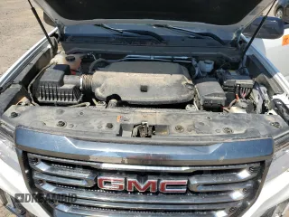 2021 GMC Canyon 4WD AT4 z VIN 1GTG6FEN5M1118081, wystawiony jako Copart lot #52452785 z przebiegiem 92 960 mil mil oraz Szkody całkowita. Historia ofert i sprzedaży dostępna na DreamBid. Obrazek 11.