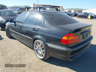 2005 BMW 3 Series 330i with VIN WBAEV53445KM41495, listed as a IAAI auction lot 41659065 with 164,868 mi miles. Bid and sale history available at carsss.com. Image 3.