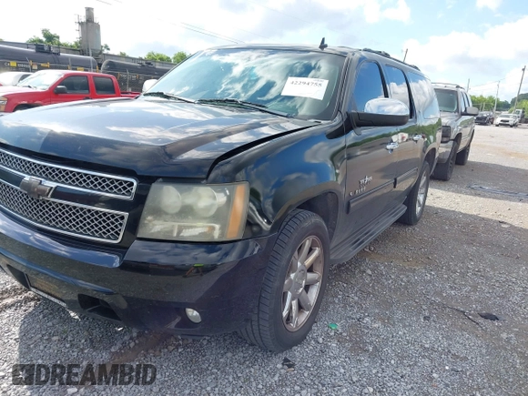 2011 Chevrolet Suburban LT z VIN 1GNSCJE0XBR133465, wystawiony jako IAAI lot #42294755 z przebiegiem 328 824 mil mil oraz . Historia ofert i sprzedaży dostępna na DreamBid. Obrazek 17.