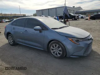 2023 Toyota Corolla LE with VIN JTDB4MEE8P3015055, listed as a Copart auction lot 50380345 with 20,548 mi miles and Salvage Title. Bid and sale history available at DreamBid. Image 4.