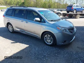 2012 Toyota Sienna XLE AAS with VIN 5TDYK3DC8CS257542, listed as a IAAI auction lot 42061520 with 166,449 mi miles. Bid and sale history available at carsss.com. Image 1.