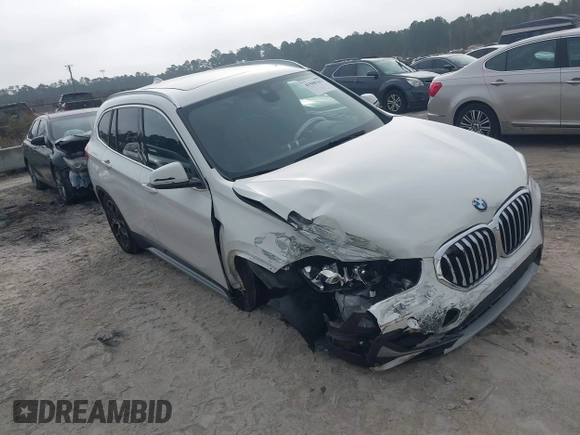 2022 BMW X1 xDrive28i z VIN WBXJG9C0XN5U89973, wystawiony jako IAAI lot #41508343 z przebiegiem 67 424 mil mil oraz . Historia ofert i sprzedaży dostępna na DreamBid. Obrazek 1.