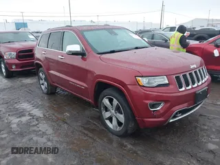 2014 Jeep Grand Cherokee Overland with VIN 1C4RJFCG9EC299235, listed as a IAAI auction lot 41670065 with 108,589 mi miles and . Bid and sale history available at DreamBid. Image 1.