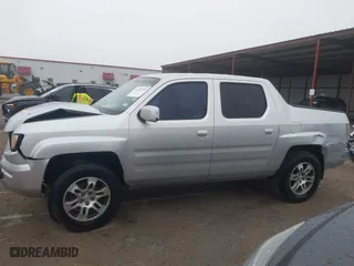 2006 Honda Ridgeline RTL with VIN 2HJYK16526H531190, listed as a IAAI auction lot 41450393 with 146,646 mi miles. Bid and sale history available at carsss.com. Image 14.