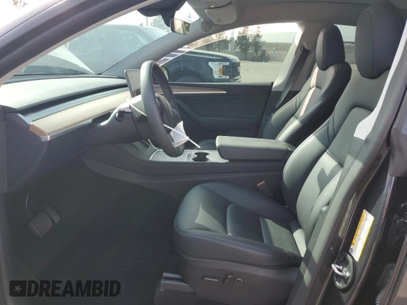 2024 Tesla Model Y Long Range with VIN 7SAYGDEE2RA244242, listed as a Copart auction lot 52635095 with 4,994 mi miles and Salvage title. Bid and sale history available at DreamBid. Image 7.