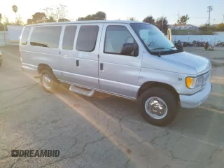 1999 Ford Econoline Passenger XL with VIN 1FBSS31L6XHC07800, listed as a Copart auction lot 83122494 with 96,238 mi miles and Clean Title. Bid and sale history available at DreamBid. Image 4.