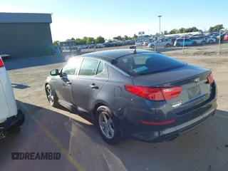 2015 Kia Optima LX with VIN KNAGM4A79F5547332, listed as a IAAI auction lot 42711552 with 154,318 mi miles and . Bid and sale history available at DreamBid. Image 3.