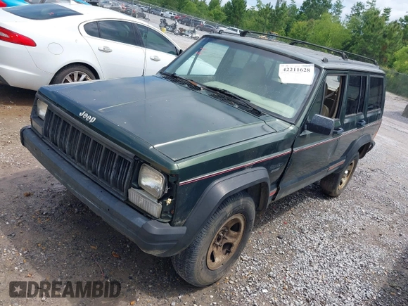 1996 Jeep Cherokee Sport with VIN 1J4FT68S6TL269966, listed as a IAAI auction lot 42211628 with 212,944 mi miles and . Bid and sale history available at DreamBid. Image 2.