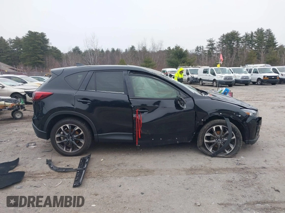 2016 Mazda CX-5 Grand Touring with VIN JM3KE4DY1G0685449, listed as a IAAI auction lot 41162840 with 134,525 mi miles. Bid and sale history available at carsss.com. Image 14.