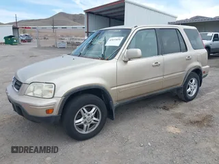 2000 Honda CR-V SE with VIN JHLRD1874YC046995, listed as a IAAI auction lot 42033059 with 218,484 mi miles. Bid and sale history available at carsss.com. Image 2.