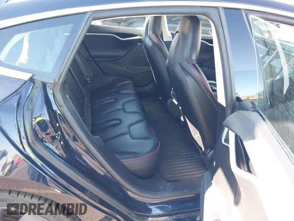 2014 Tesla Model S 60 with VIN 5YJSA1H14EFP57209, listed as a IAAI auction lot 41305157 with 141,364 mi miles and . Bid and sale history available at DreamBid. Image 8.