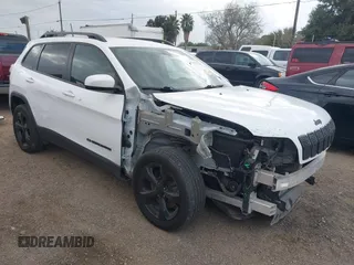 2019 Jeep Cherokee Latitude Plus with VIN 1C4PJLLBXKD373391, listed as a IAAI auction lot 41097780 with 82,472 mi miles. Bid and sale history available at carsss.com. Image 1.