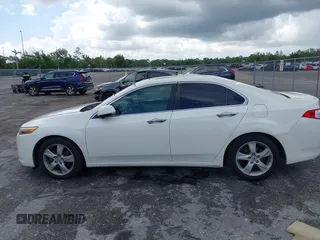 2009 Acura TSX with VIN JH4CU26649C018276, listed as a IAAI auction lot 42469738 with 130,961 mi miles and . Bid and sale history available at DreamBid. Image 14.