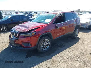 2019 Jeep Cherokee Altitude with VIN 1C4PJMLN6KD174564, listed as a IAAI auction lot 41602798 with 87,230 mi miles and . Bid and sale history available at DreamBid. Image 2.