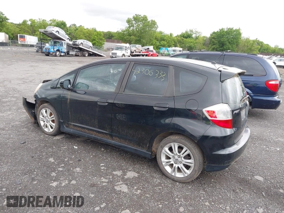 2009 Honda Fit Sport with VIN JHMGE88469S055316, listed as a IAAI auction lot 42306333 with 144,377 mi miles and . Bid and sale history available at DreamBid. Image 3.