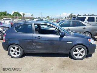 2007 Hyundai Accent SE with VIN KMHCN36C37U031369, listed as a IAAI auction lot 42093760 with 95,919 mi miles. Bid and sale history available at carsss.com. Image 13.